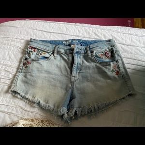 High waisted distressed floral denim shorts
